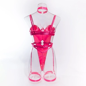 Close-up of rose red bodysuit with heart-shaped metal buckles and cutout harness details
