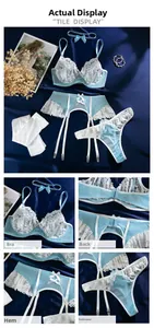 Détails de lingerie en dentelle bleu clair avec porte-jarretelles et bas blancs brodés