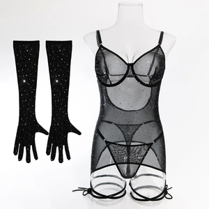 Detail showing sheer black mesh fabric with sparkling sequins and matching long gloves