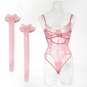 Pink lace bodysuit lingerie with floral patterns and matching mesh stockings on a mannequin