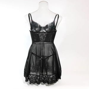 Detailed view of sheer black mesh babydoll set with intricate floral lace trim and straps