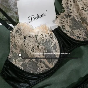 Détail de dentelle florale transparente épissée avec du satin noir sur le soutien-gorge
