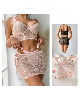 Detailed view of pink floral lace lingerie set with underwire bra and garter skirt