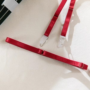 Adjustable red elastic garter straps with silver metal slides and secure clips