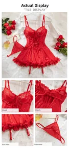 Detail of red lace lingerie set with silver sequins and ruffled mesh hemline for women