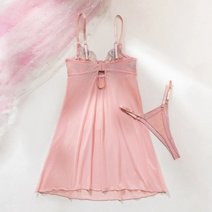 Detail of pink lace teddy with flower embroidery and sheer mesh fabric textures