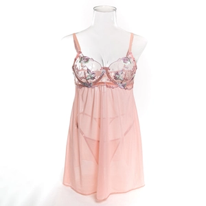 Detail of pink mesh nightdress with purple floral embroidery and lace lingerie