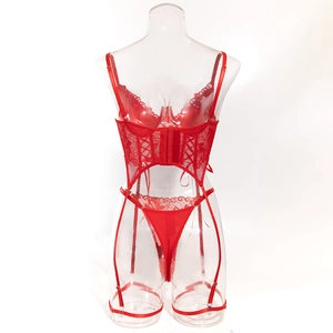 Detailed view of the red floral lace corset with hook-and-eye back closure and mesh thong
