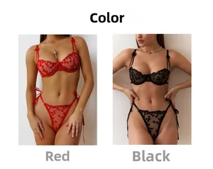 Set di lingerie in pizzo con ricamo a cuore e perizoma con lacci nei colori rosso e nero