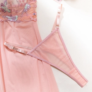 Detail of pink mesh sleepwear set with exquisite purple and green floral embroidery