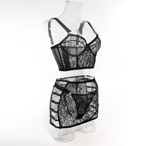 Detailed view of black lace lingerie set with floral patterns and sheer mesh fabric
