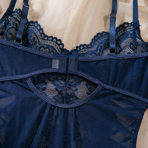 Detailed back view of navy blue lace bodysuit with adjustable straps and hook-eye closure