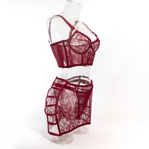 Detail shot of wine red lace lingerie set with underwired bodice and garter belt