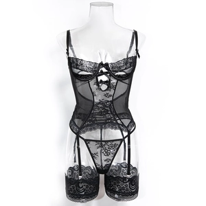 Detail of black lace bodysuit with sheer mesh panels and three decorative front bows