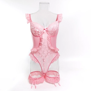 Detailed view of pink lace bodysuit set with satin bows and matching leg garters