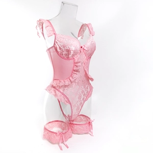 Detail of pink lace bodysuit set featuring wired cups and matching bow leg garters