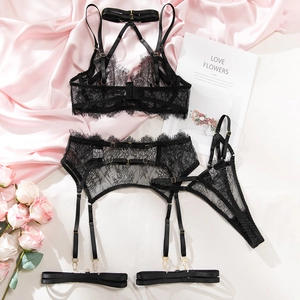 Detail view of 4-piece black floral eyelash lace lingerie set with garters and chokers
