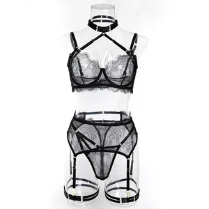 Close-up of black eyelash lace lingerie set featuring underwire cups and garter straps