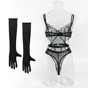 Sexy black lace bodysuit with sheer mesh gloves on mannequin, elegant cutaway design