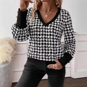 Women's V-neck long sleeve houndstooth knit top with gold buttons and black trim