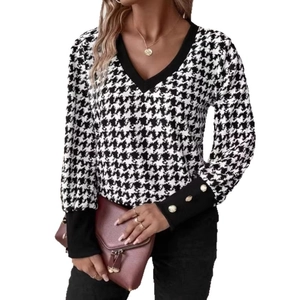 Women's V-neck long sleeve top featuring classic houndstooth pattern and gold buttons