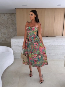 Floral print summer midi dress featuring spaghetti straps and decorative front buttons