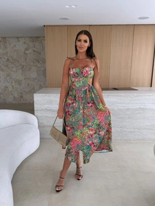 Close-up of a floral print dress with button-down front and adjustable tie straps