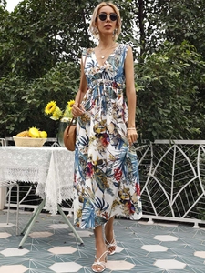 Detail of floral V-neck sleeveless maxi dress with a waist tie in a garden setting