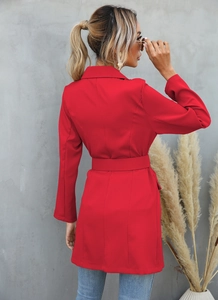 Rear view of a red longline blazer coat with waist belt highlighting the back tailoring