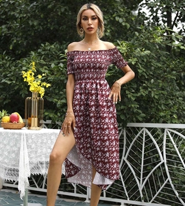 Detail of burgundy floral off-shoulder dress with smocked bodice and high side slit