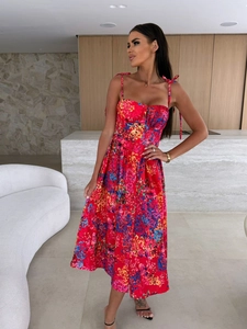 Detail of red floral midi dress with button-up corset bodice and adjustable tie straps