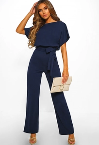 Full view of women's dark blue wide-leg jumpsuit with short sleeves and waist tie belt