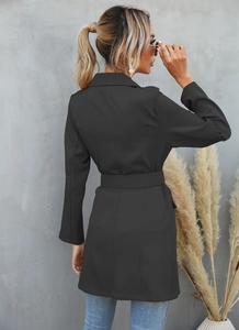 Back view of a long black blazer coat with an adjustable waist belt for a slim fit