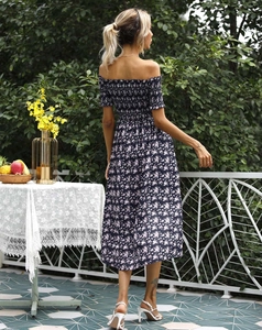 Back view of a summer floral off-shoulder dress with a navy base and white flowers