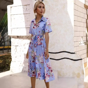 Floral short sleeve midi dress with lapel collar and waist tie in light blue fabric