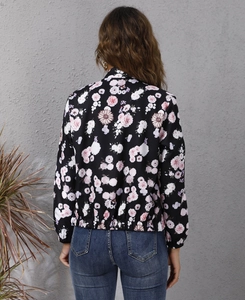 Rear view of floral bomber jacket featuring pink flower print and ribbed elastic hem