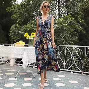 Deep blue sleeveless V-neck maxi dress with tropical floral print and drawstring waist