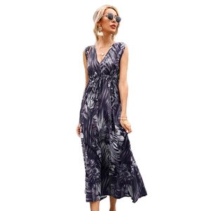 Sleeveless V-neck maxi dress featuring tropical palm leaf print and adjustable drawstring waist