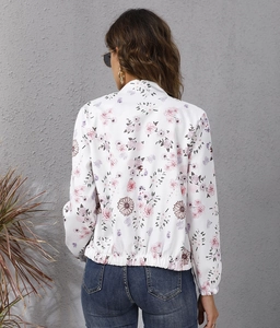 Back view of a white floral bomber jacket with purple flower prints and ribbed cuffs