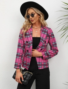 Detail view of pink and grey plaid blazer with double-breasted buttons and classic lapel
