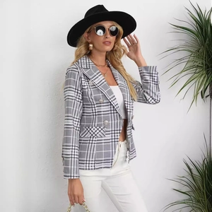 Modern black and white plaid double-breasted blazer for women with a notched lapel design