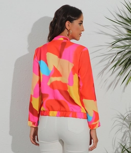 Detail of colorful abstract print on a women's bomber jacket with elasticated cuffs