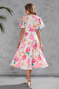 Back view of summer floral dress with butterfly sleeves and tiered bohemian skirt