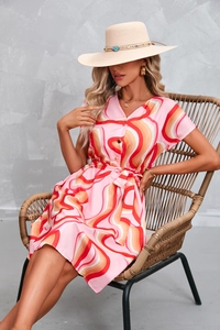Detail of elegant summer shirt dress with vintage wave print and matching waist tie