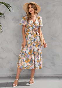Detailed view of women's floral V-neck midi dress with tiered skirt and waist tie