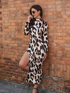Detail view of the elegant leopard print maxi dress with long sleeves and side slit design