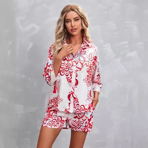 Women's 2-piece lounge set with red abstract print button-up shirt and matching shorts