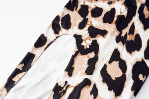 Detail of the high-quality zebra pattern fabric and neat stitching on this long sleeve dress