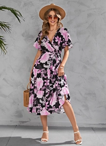 Detail of floral V-neck midi dress with tiered skirt and flutter sleeves for summer
