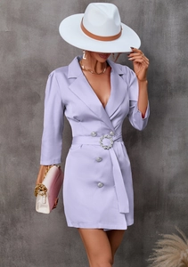 Detail of lavender double-breasted blazer dress featuring a sparkling rhinestone buckle belt